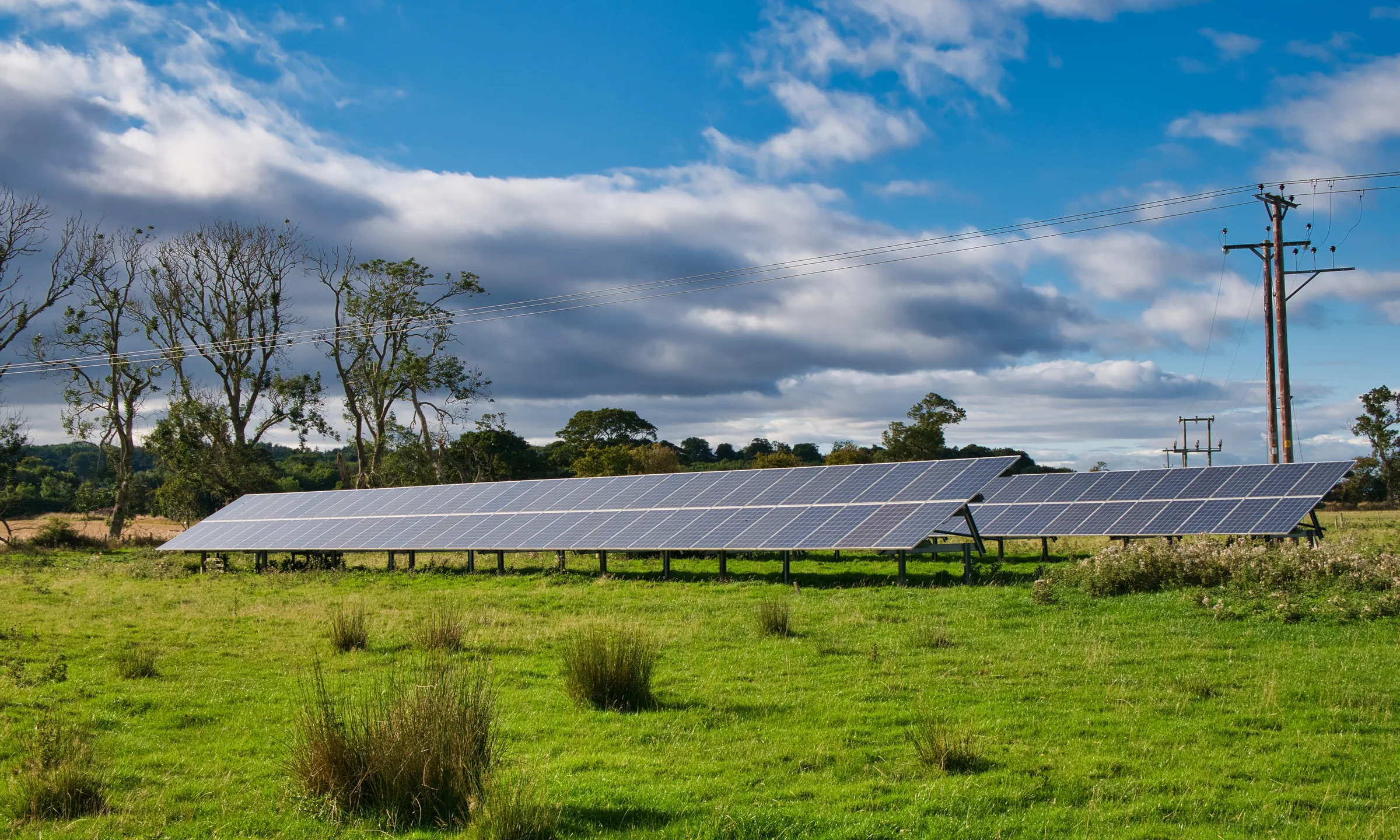 Ground-mounted solar array in a rural landscape